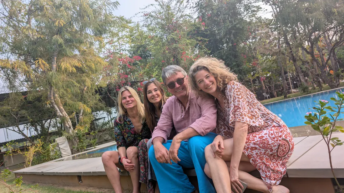 German guests taking a photo by the pool