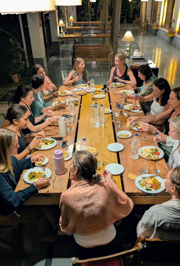 Retreat guests sharing a meal at the farm