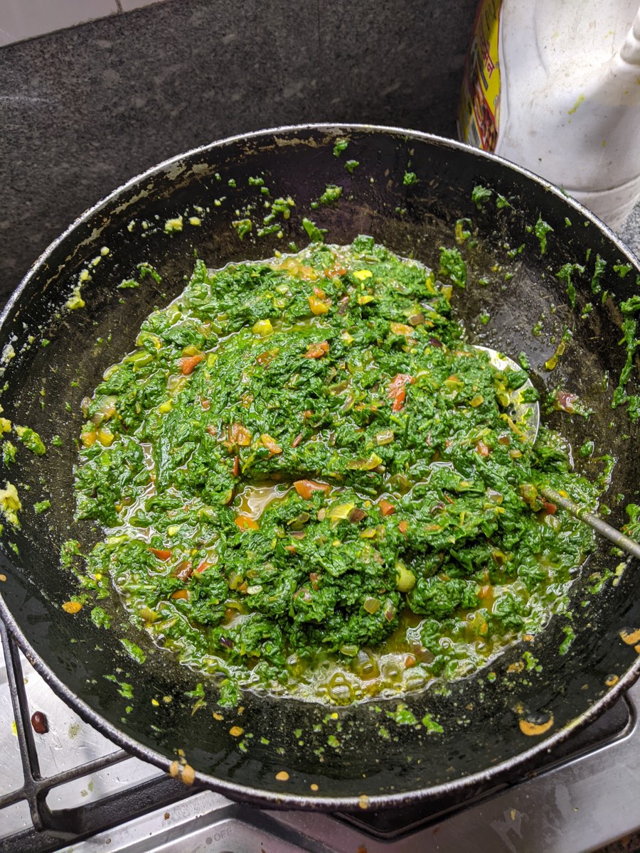 Saag cooking in the wok