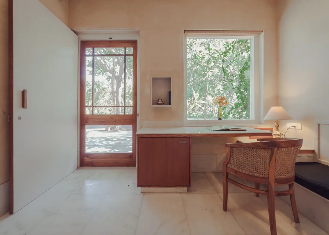 The marble desk and large garden window