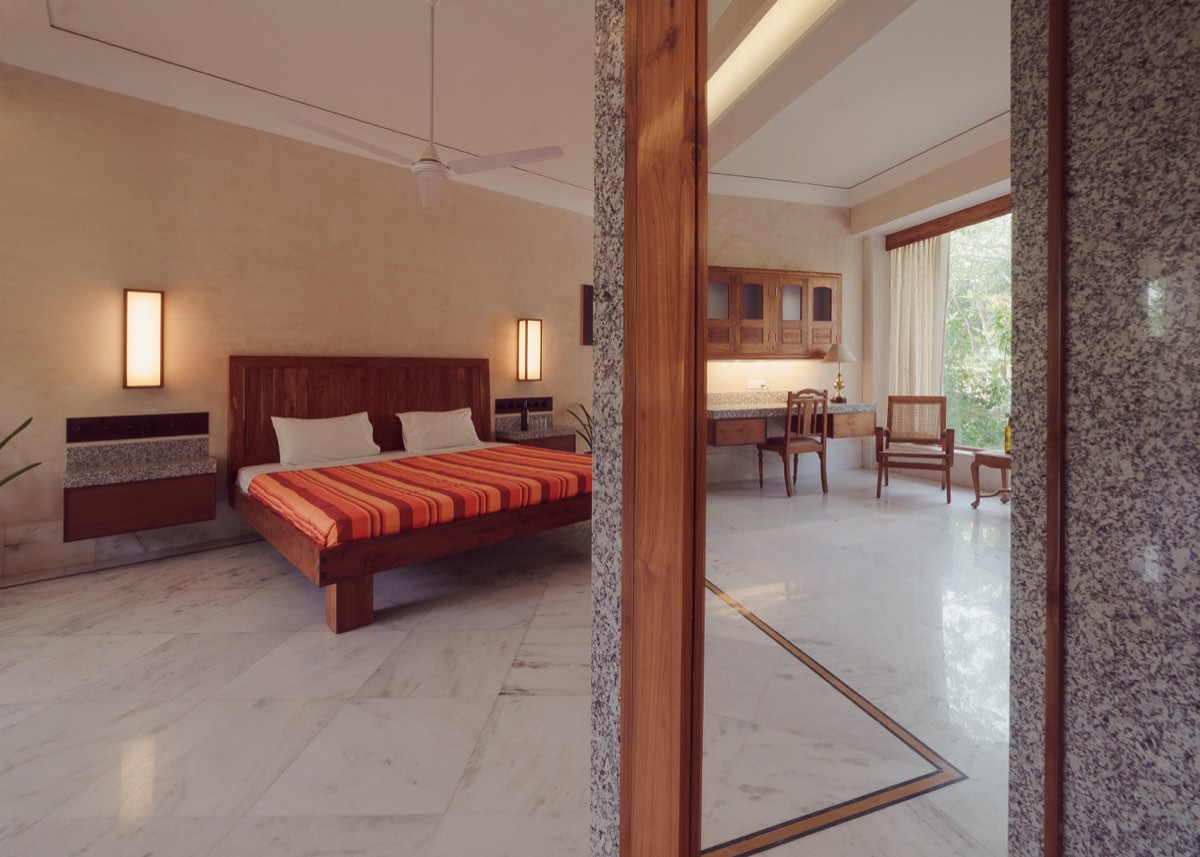 The Suite — bedroom opening to the work area and garden window